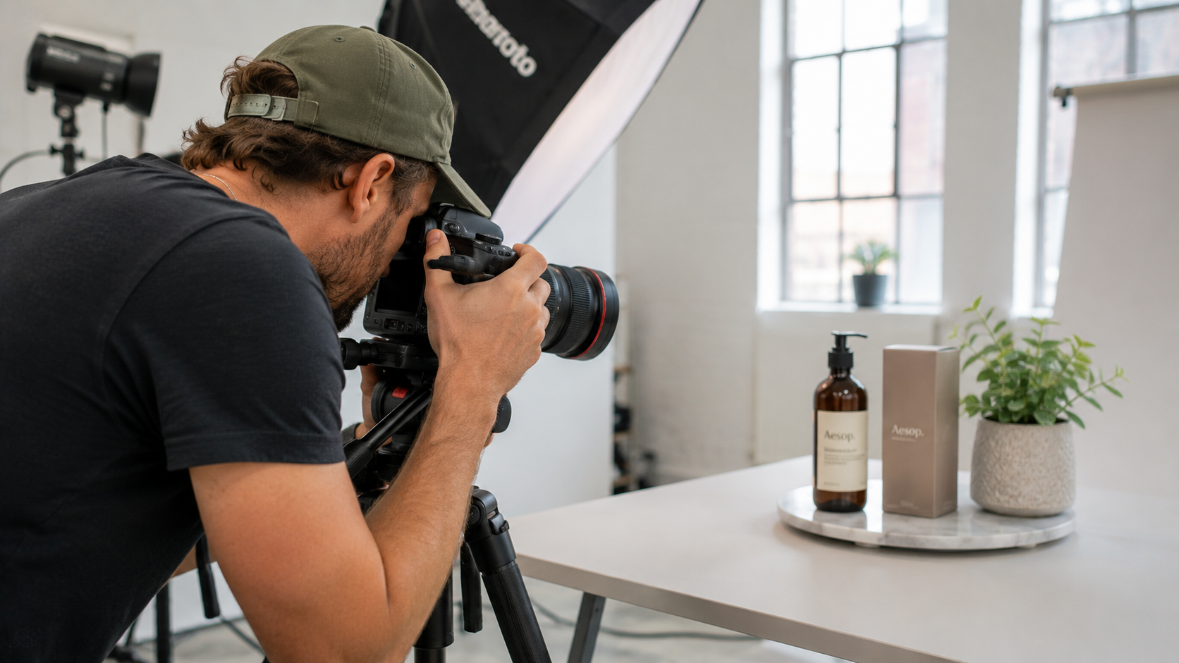 Professional photographer taking lifestyle product photos in a studio
